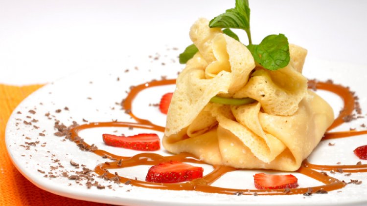 Une autre manière de présenter les crêpes... Pour plus d'originalité, voici la recette des crêpes en aumônière !