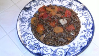 Découvrez la fameuse recette du plat de lentilles aux tomates épépinées présenté par notre ordissinaute Pierre. 